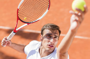 Man About to Serve in Tennis